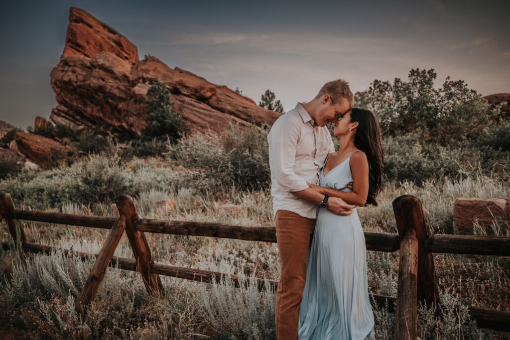 newlywed couple poses for elopement photographer during adventure elopement.