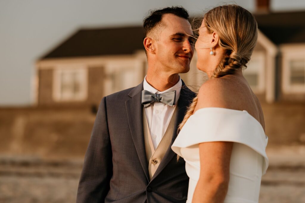Newly married couple kisses for wedding portraits during destination elopement photos.