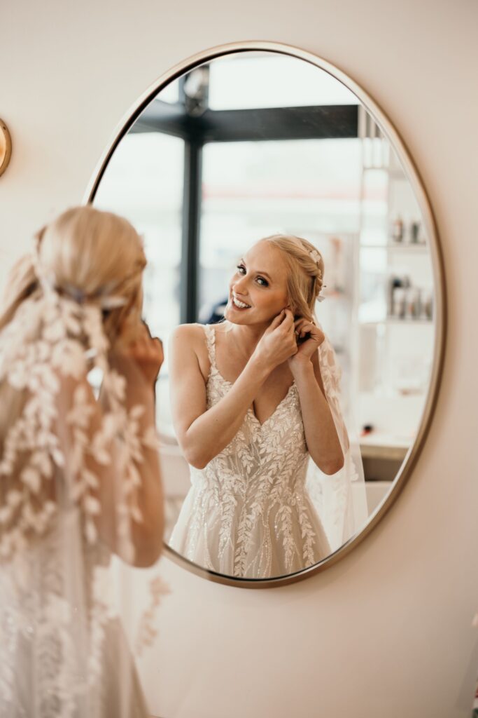 bride gets ready for her first look photos at garden of the gods in colorado springs.
