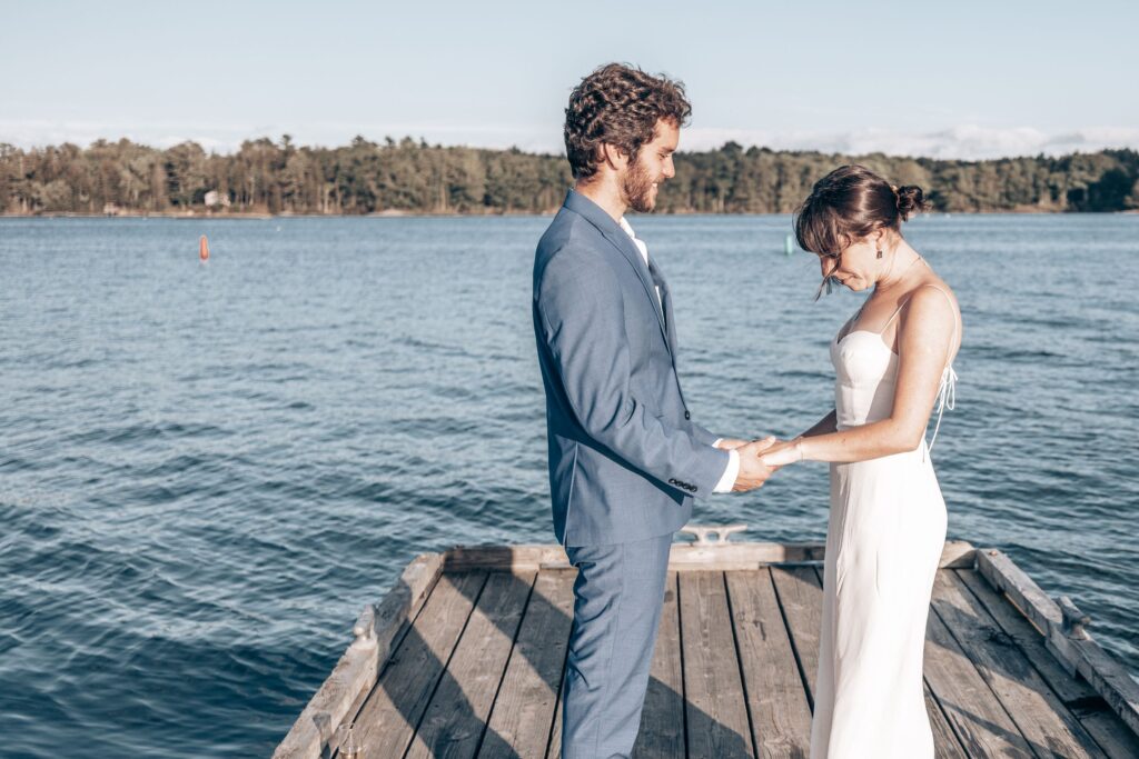 newlywed couple on dock during colorado adventure elopement at point park.
