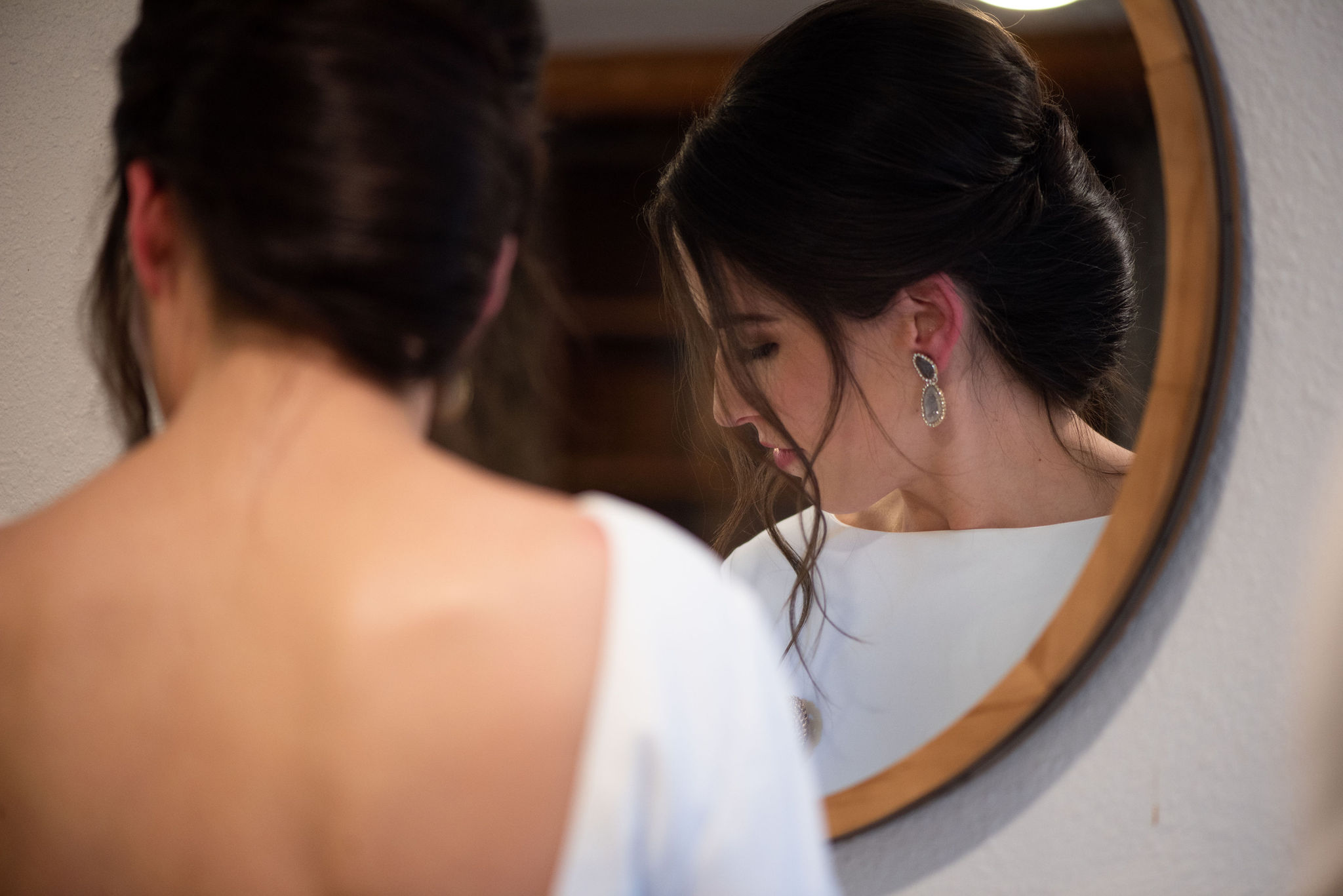 bride gets ready for her colorado micro wedding at river bend wedding venue.