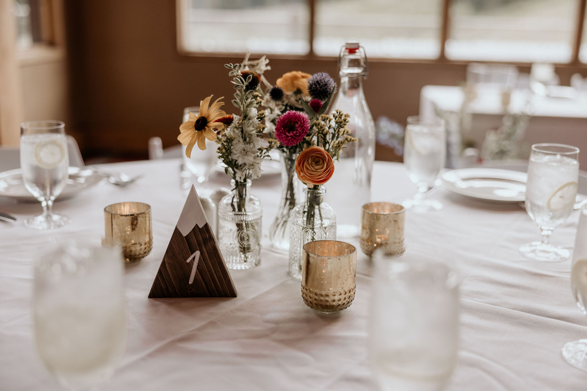 wedding details during reception at black mountain lodge in A-basin.