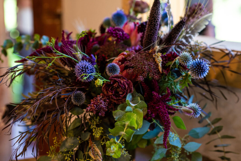 vibrant wedding bouquet by Plume and Furrow for a colorado micro wedding. 