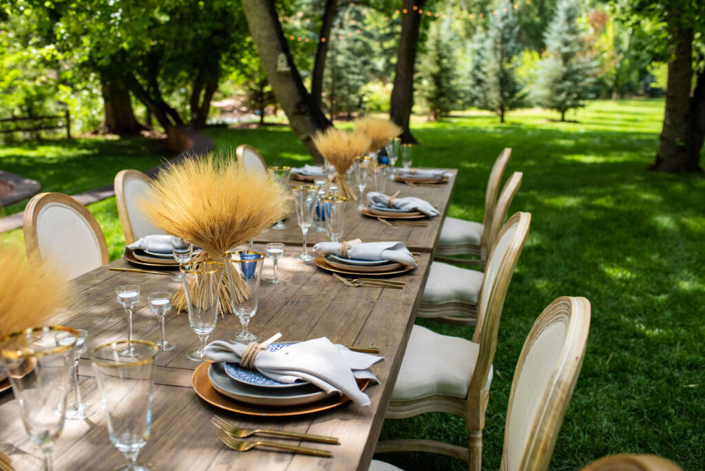 dinner table set up at river bend wedding venue in colorado.