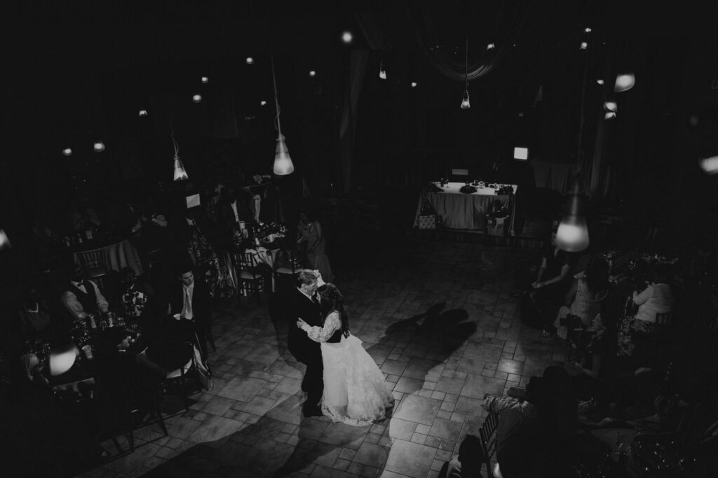 bride and groom share a last dance at their sustainable wedding in colorado.