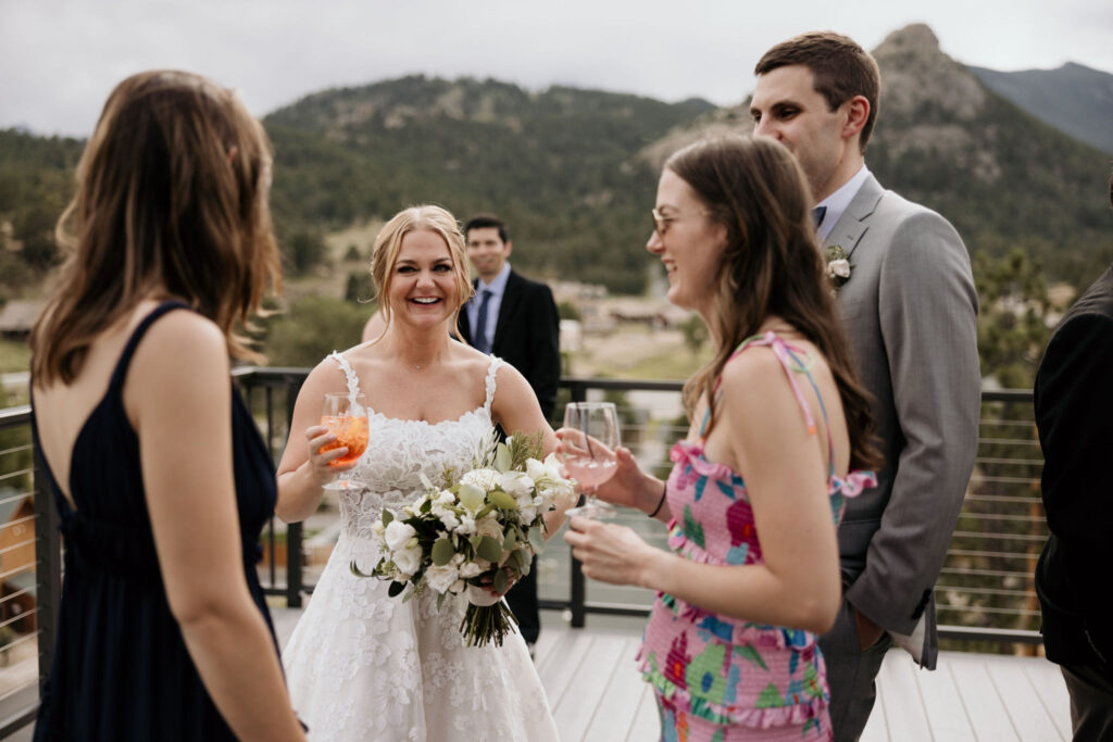 bride mingles with guests during wedding reception at skyview venue.
