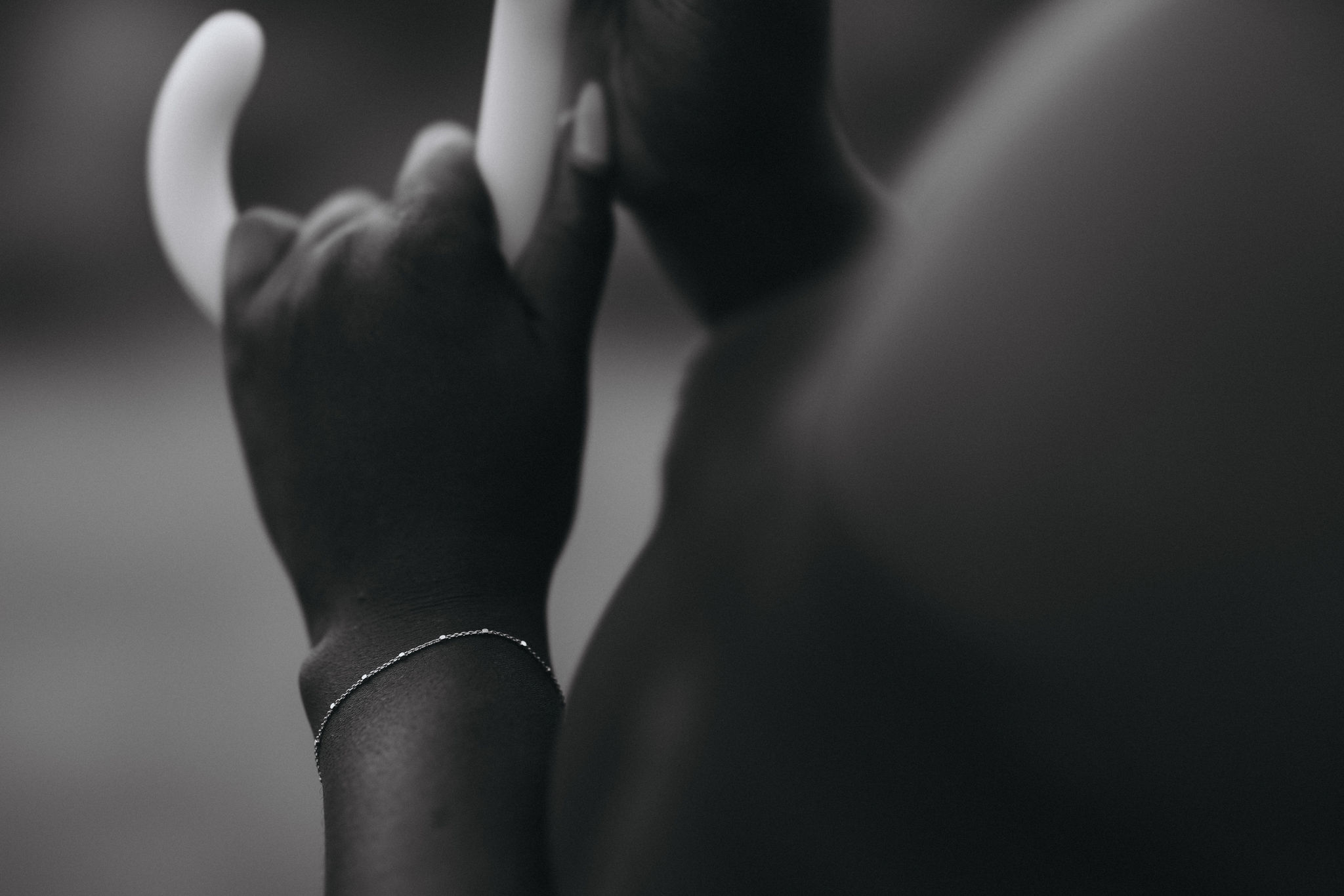close up image of someones hand holding an umbrella during a colorado mountain wedding in estes park.