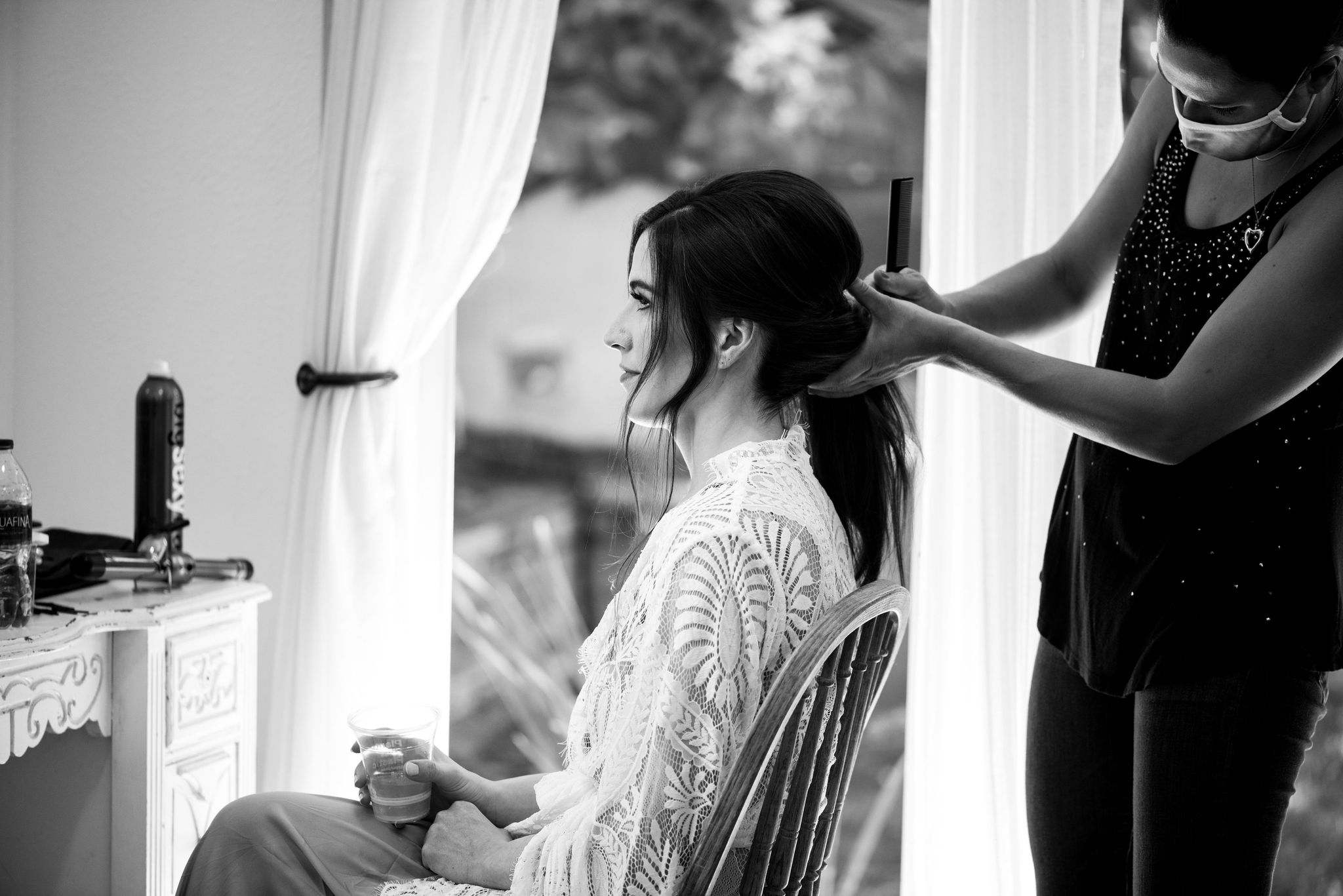bride gets hair and makeup done by ElePosh for her colorado micro wedding in lyons.