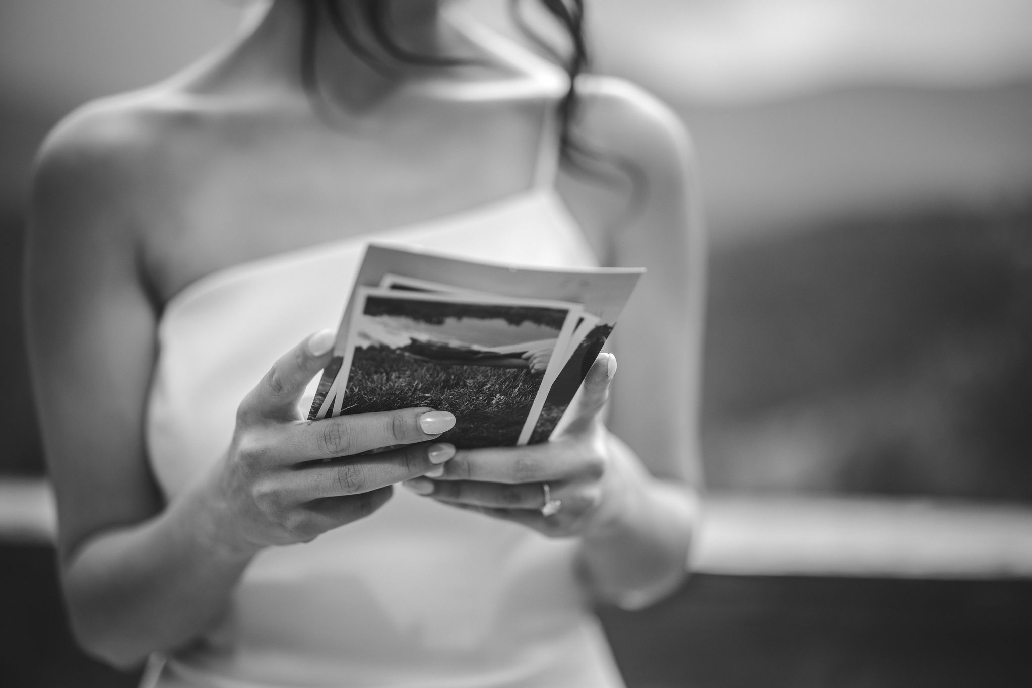 bride reads handwritten letter from husband before her colorado micro wedding ceremony