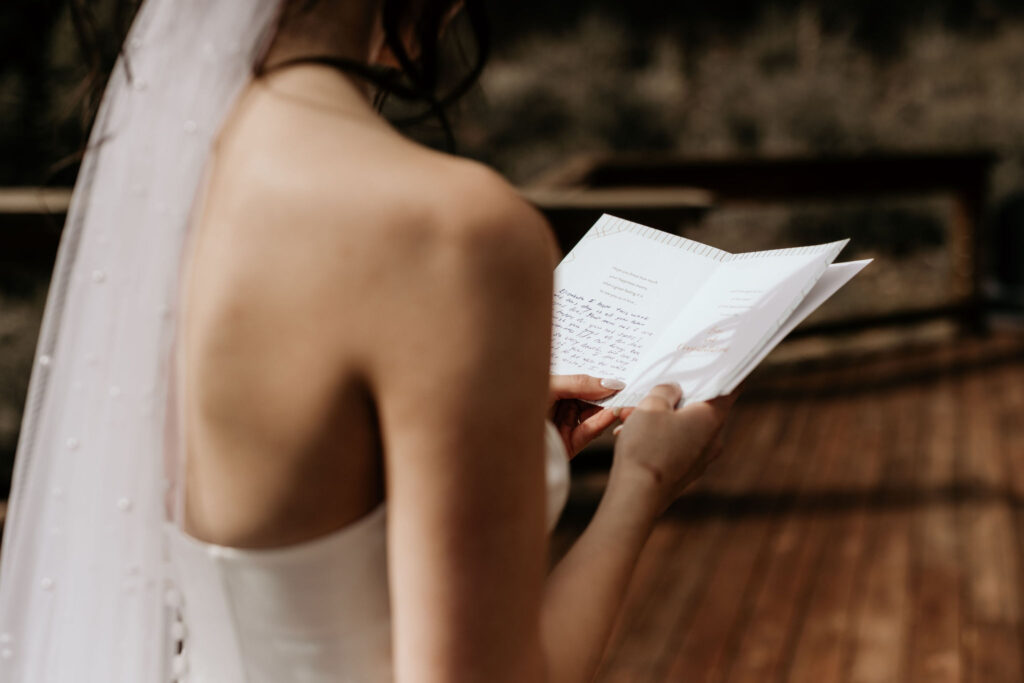 bride reads personal letter from groom.