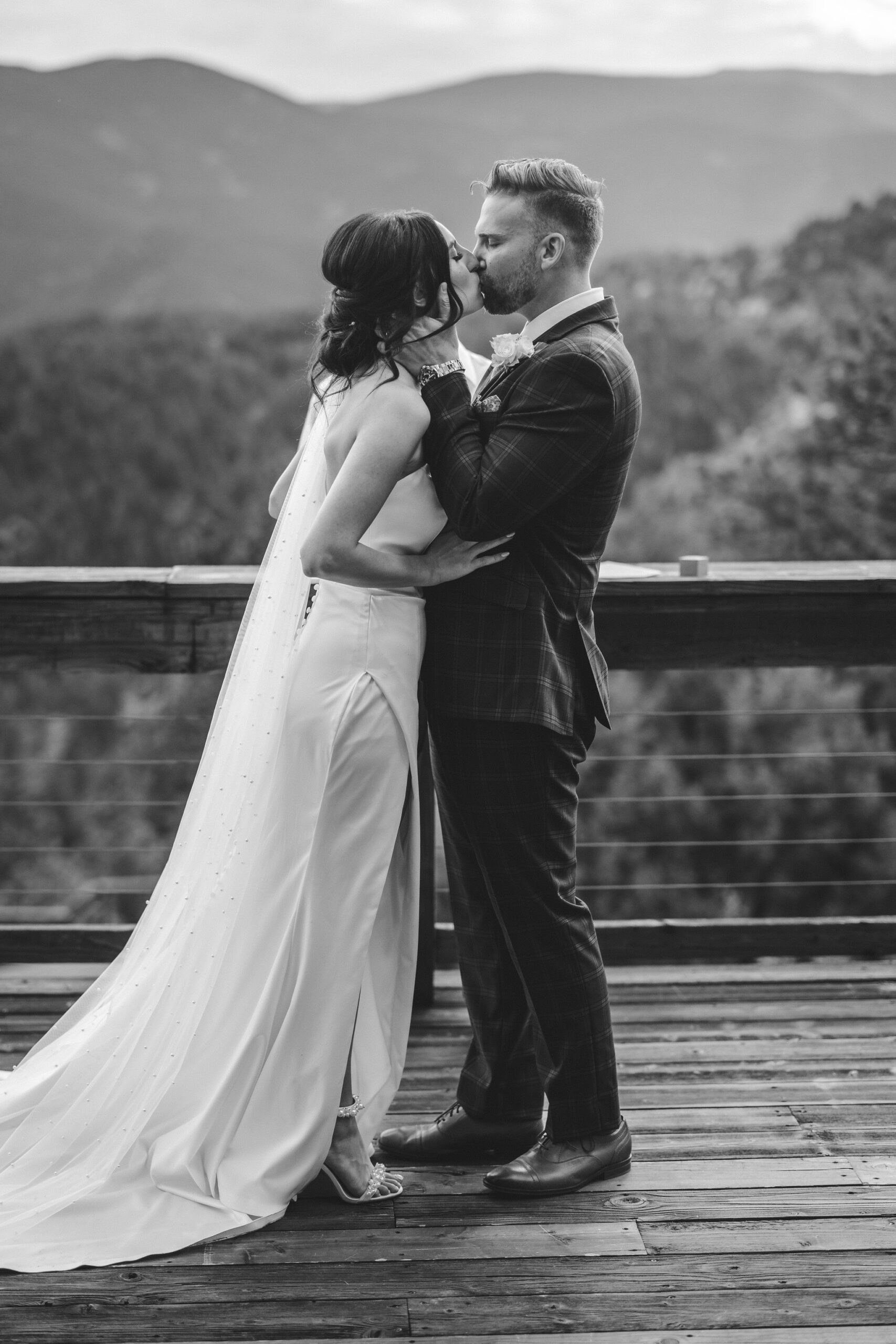 bride and groom kiss at colorado micro wedding.