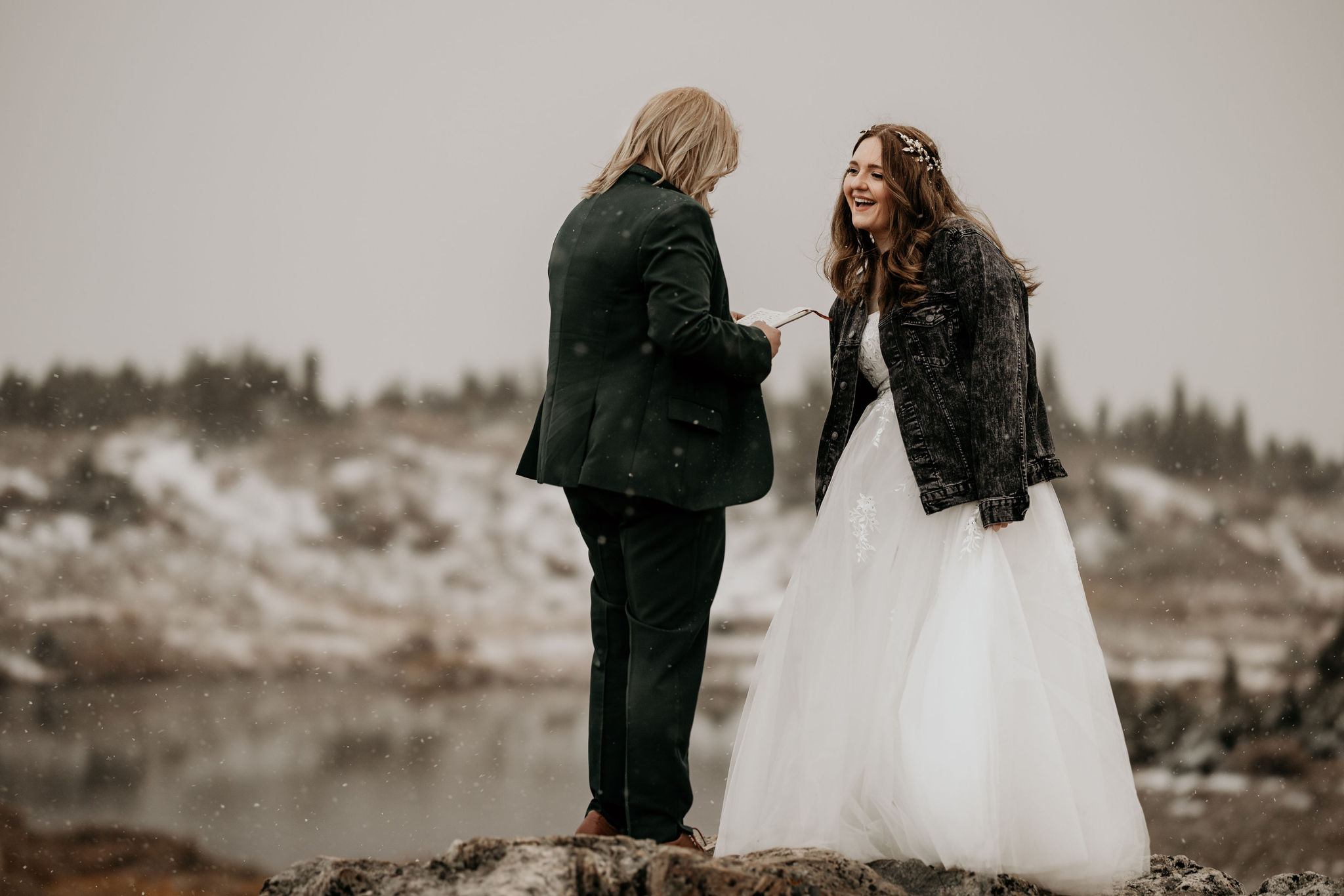 newlywed couple laugh during their simple and easy elopement ceremony.