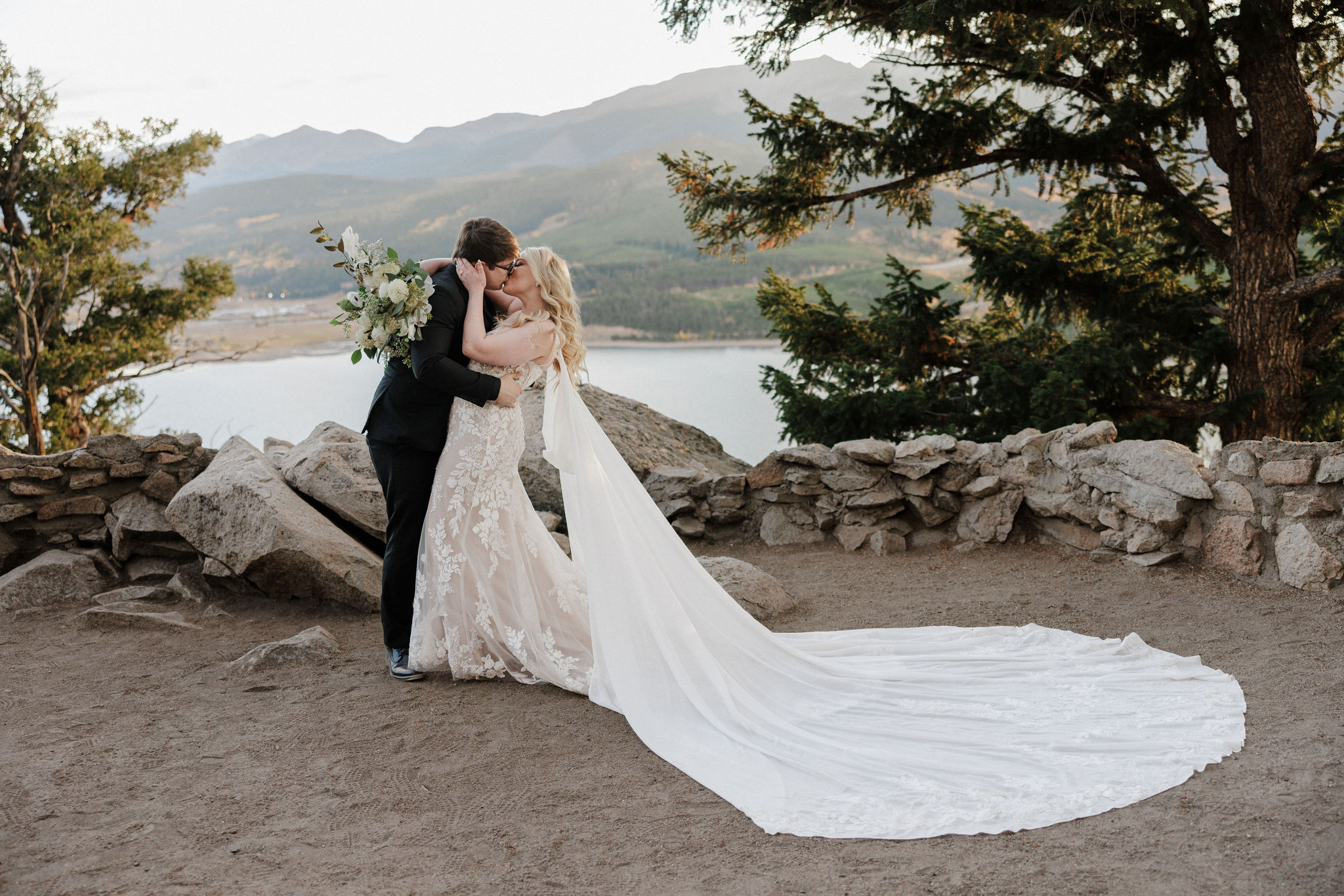 bride and groom kiss at sapphire point overlook 