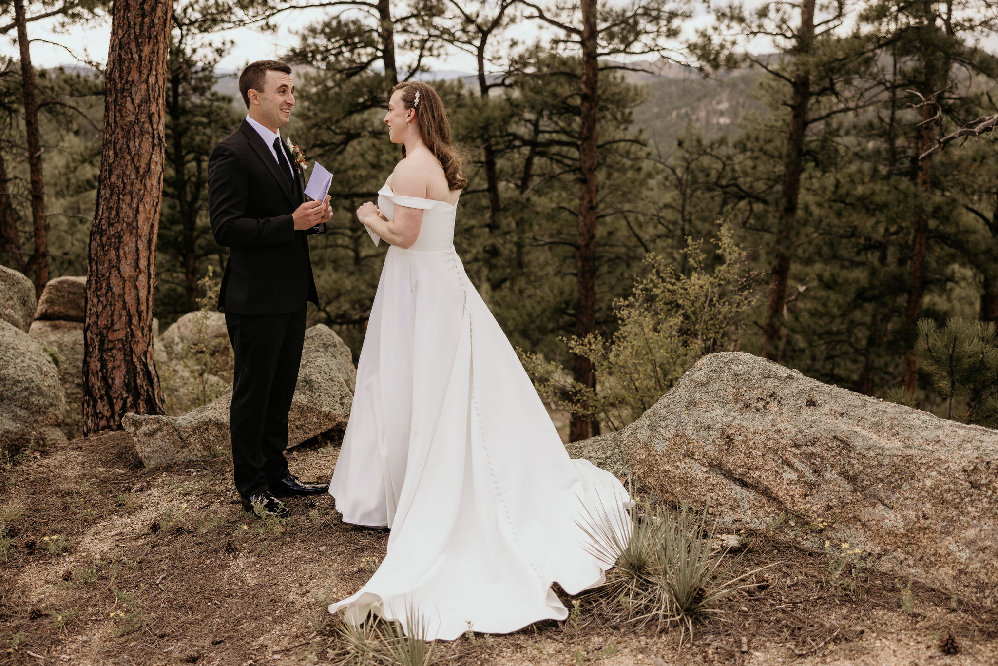 bride and groom say wedding vows at colorado elopement location.
