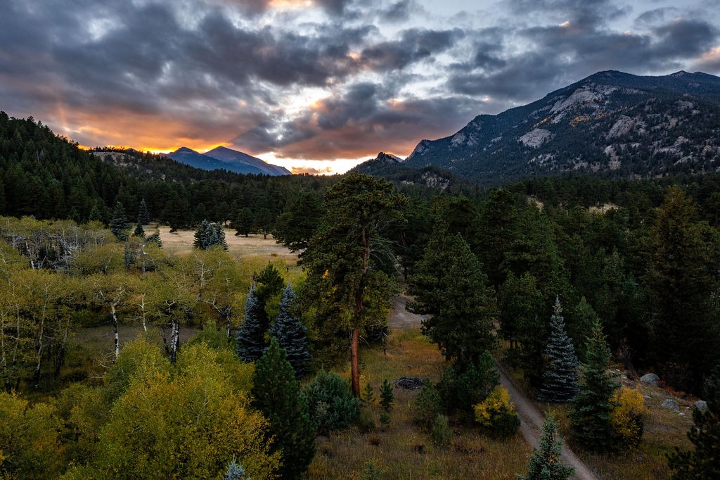 sunset over the mountains at colorado micro wedding and elopement location