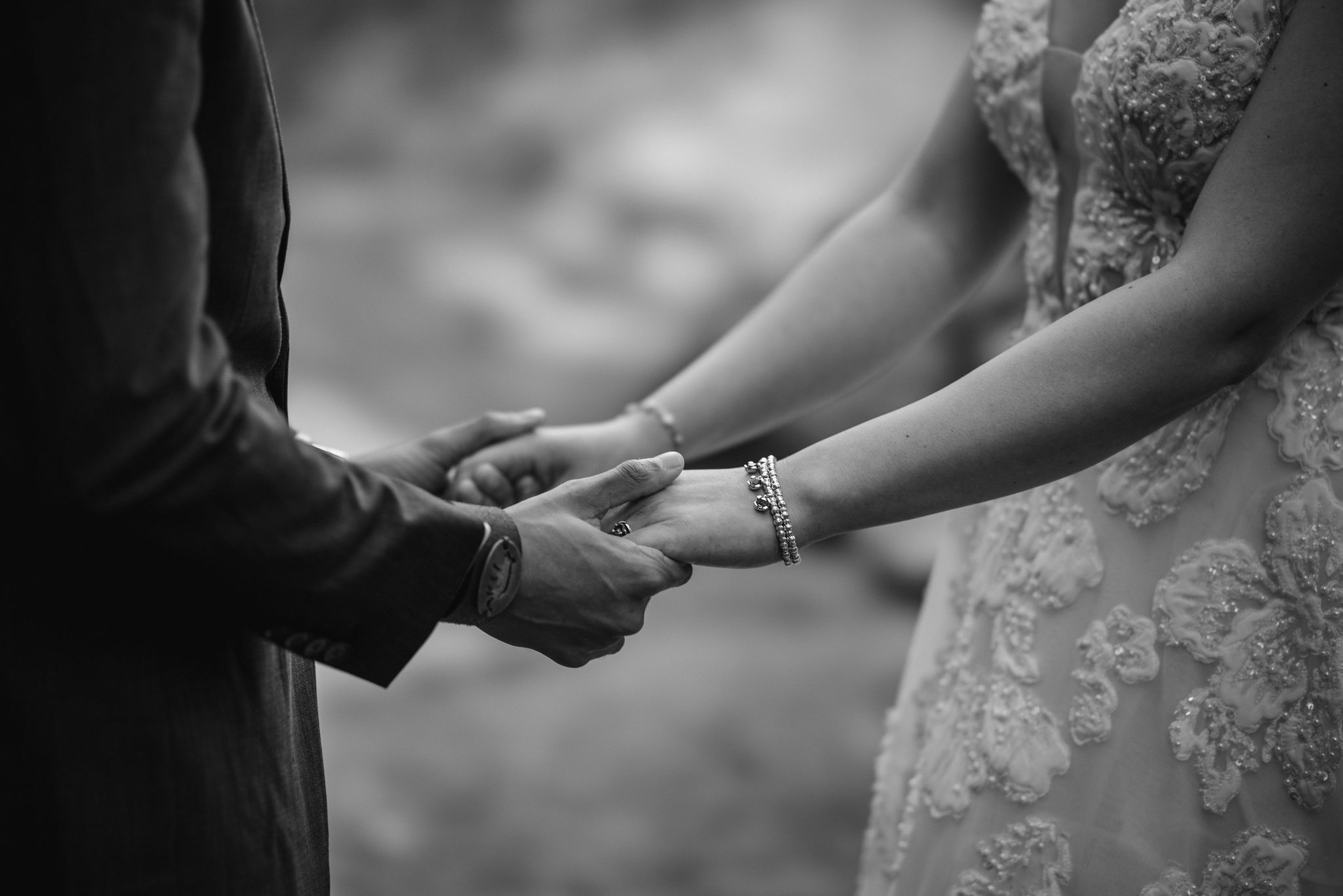 bride and groom hold hands during micro wedding.