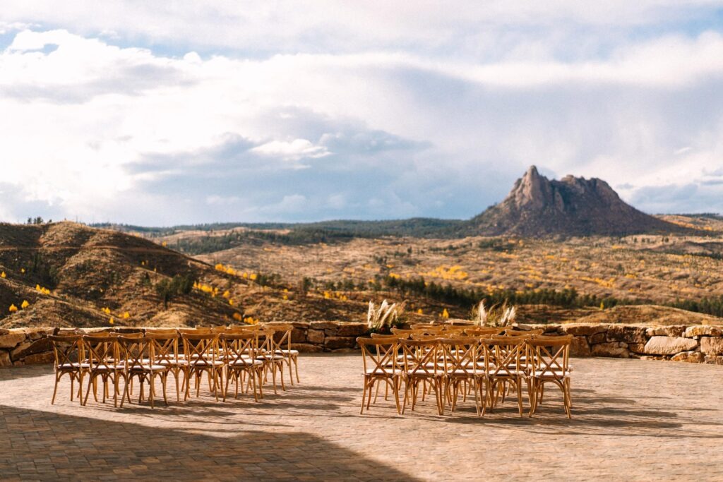 ceremony set up in front of mountains at colorado private estate rental for micro weddings and elopements