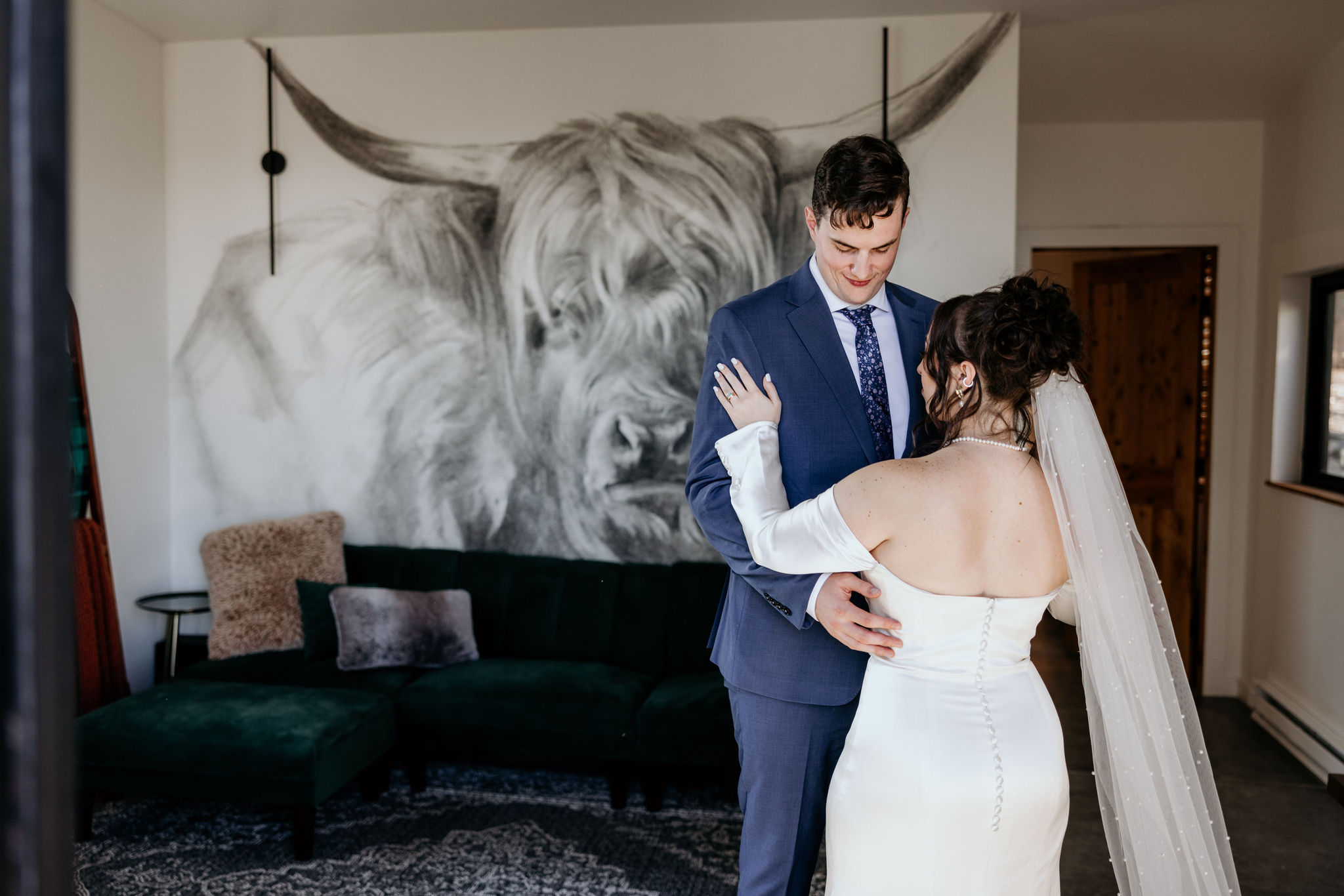 bride and groom dance in the living room during colorado airbnb elopement.