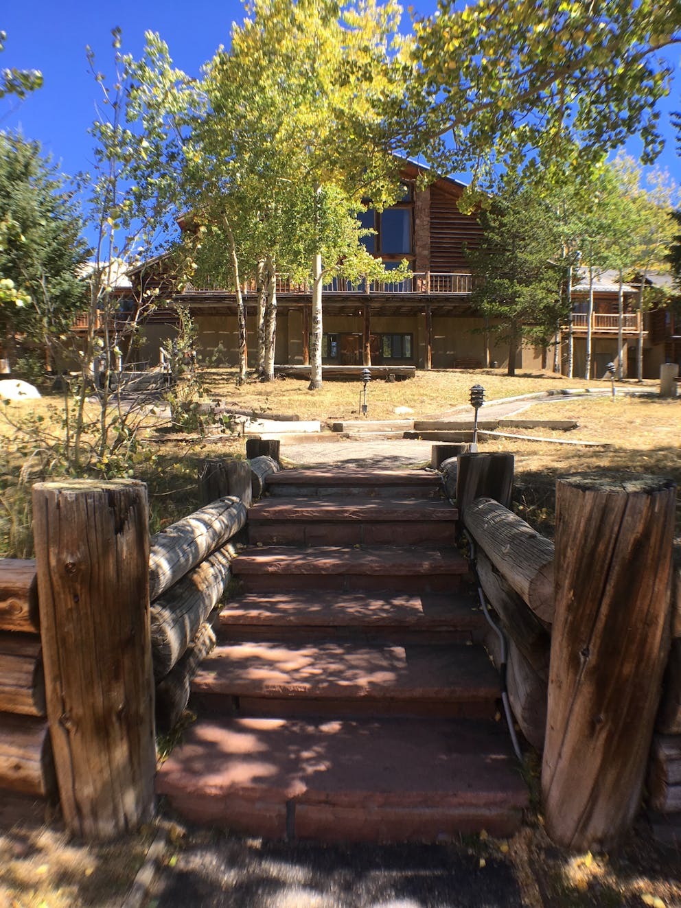 front of lodge at colorado micro wedding + elopement private estate venue