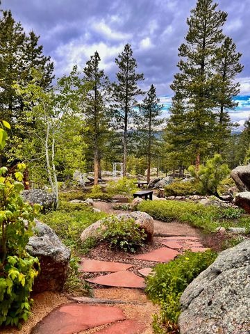 stone pathway weaves through colorado vrbo for micro weddings and elopements