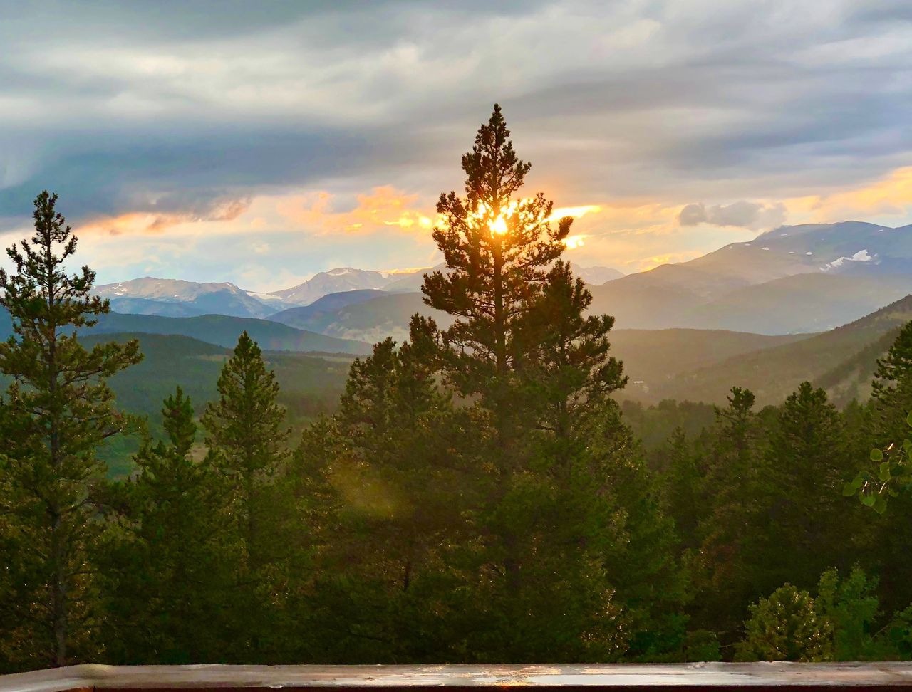 view of sunset over the mountains at colorado vrbo for micro weddings and elopements