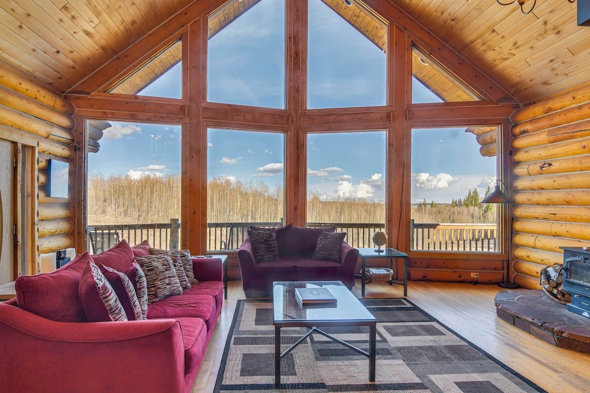 living room with large windows at colorado airbnb micro wedding + elopement venue 