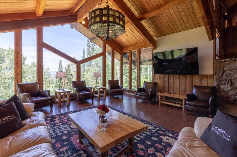 living room with large windows at  private estate rental for micro weddings and elopements in Colorado