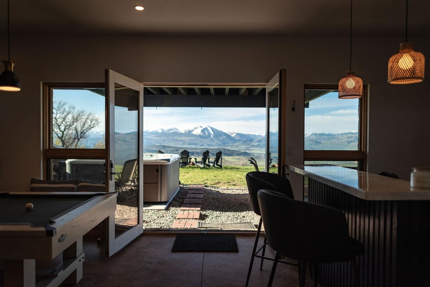 view of mountains from basement at colorado micro wedding + elopement airbnb rental