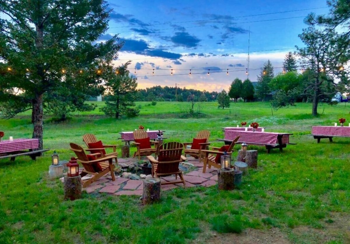 chairs set up around fire pits at colorado vrbo micro wedding venue