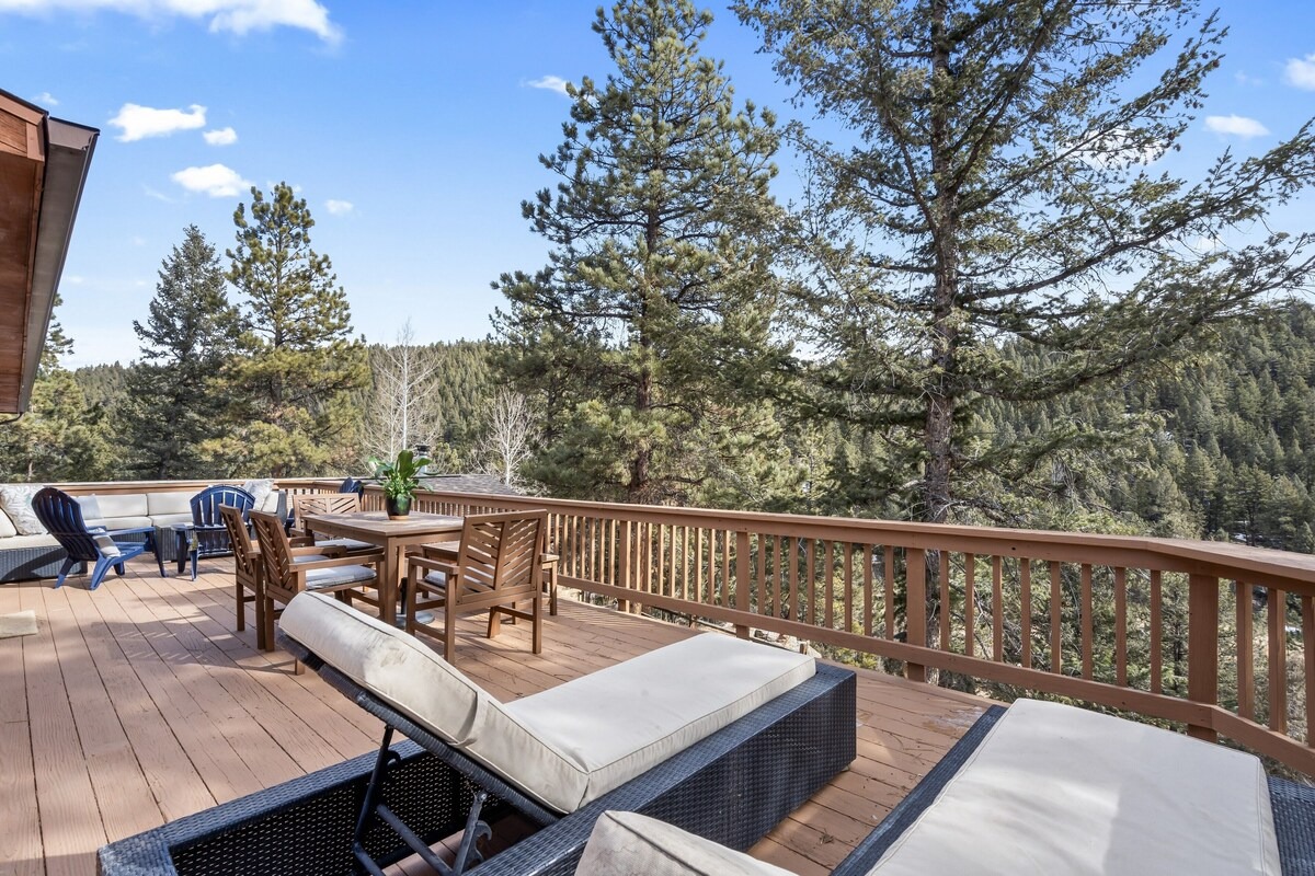 chairs and table set up on deck of colorado vrbo micro wedding + elopement venue 