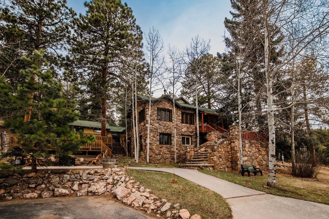 outside view of mountain colorado airbnb + vrbo micro wedding venue less than an hour from denver