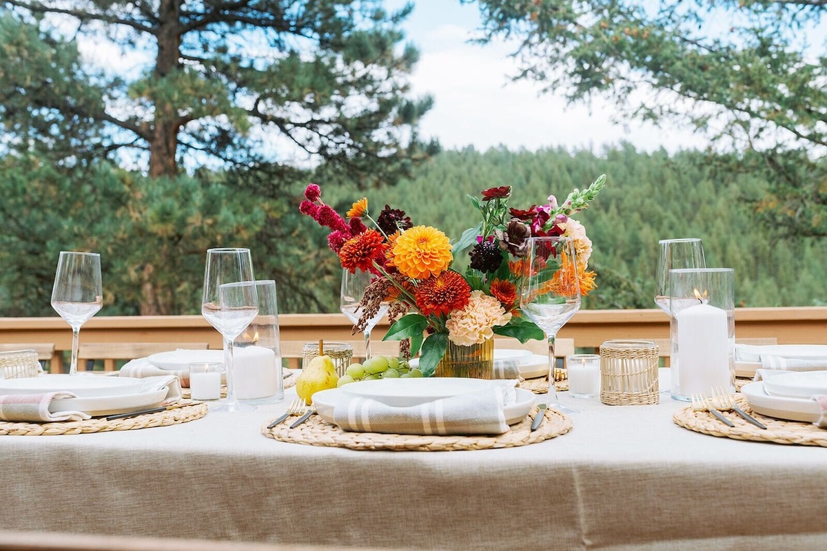 dinner setup with florals at colorado vrbo micro wedding + elopement venue 