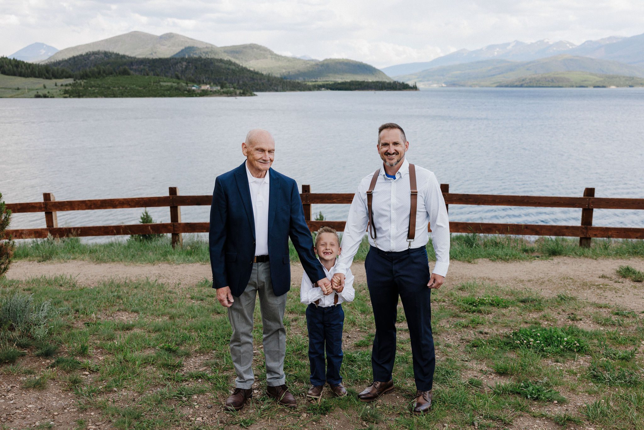 groom stand with father and son during their elopement with kids in colorado