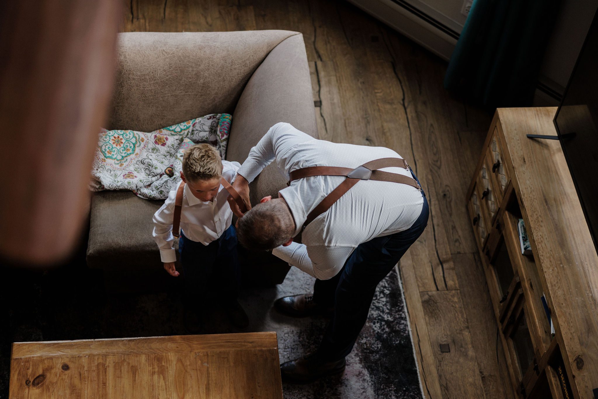 groom helps son with wedding attire, after learning how to elope with kids
