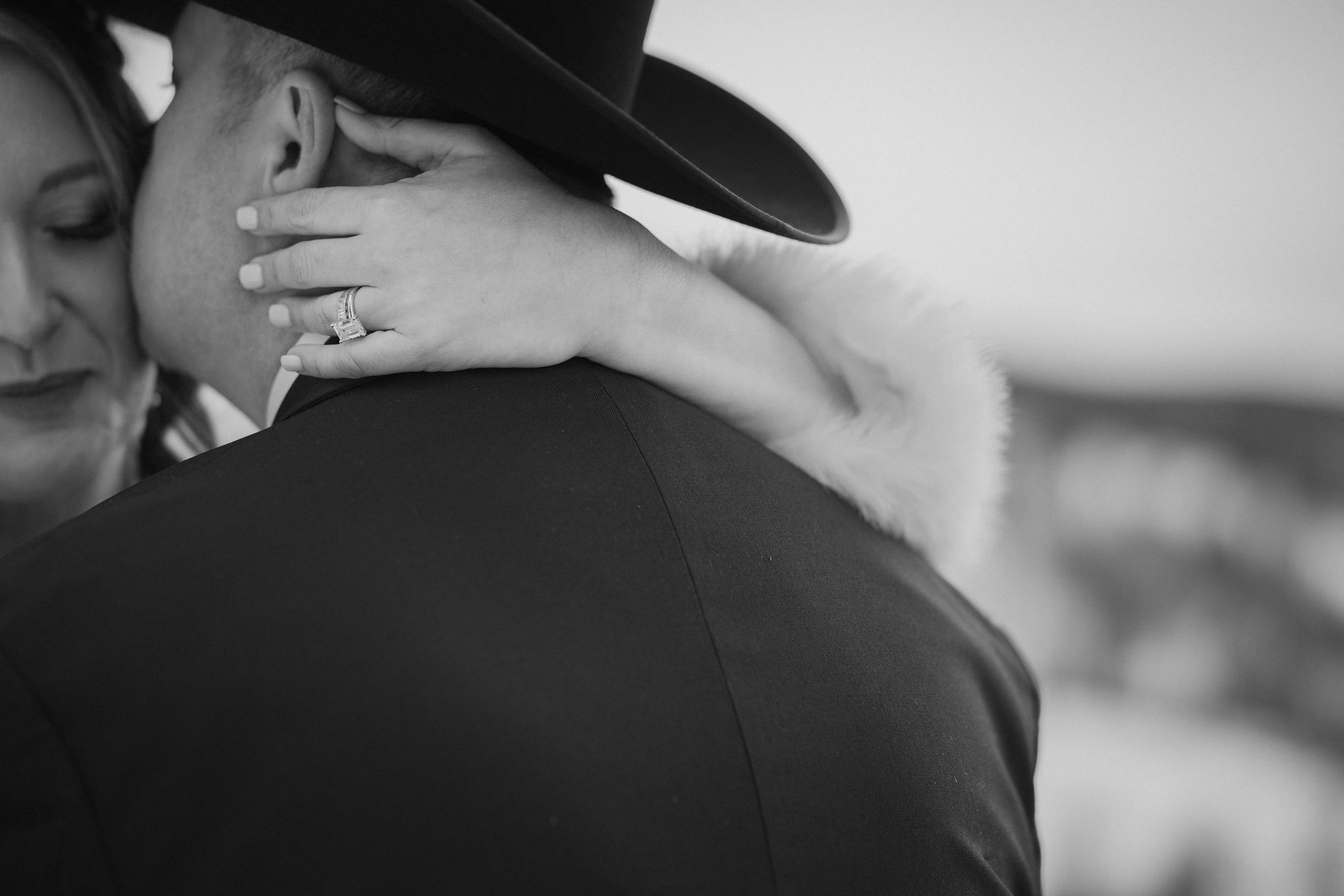 bride and groom embrace during sapphire point elopement.