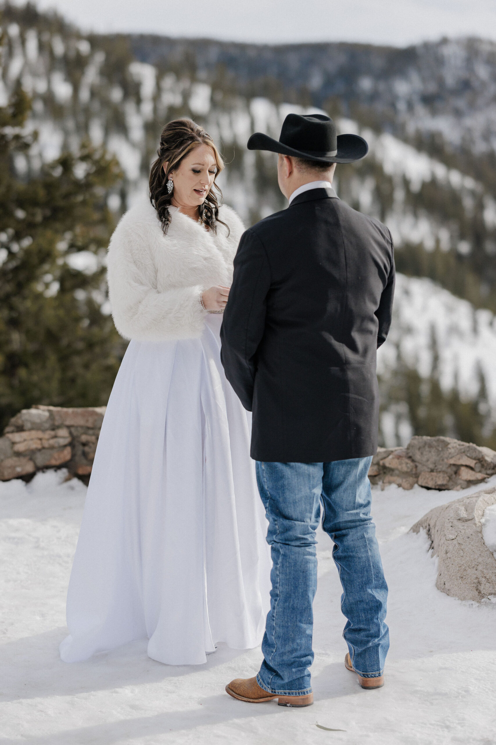 Bride reads vows to groom during Sapphire Point Overlook elopement.