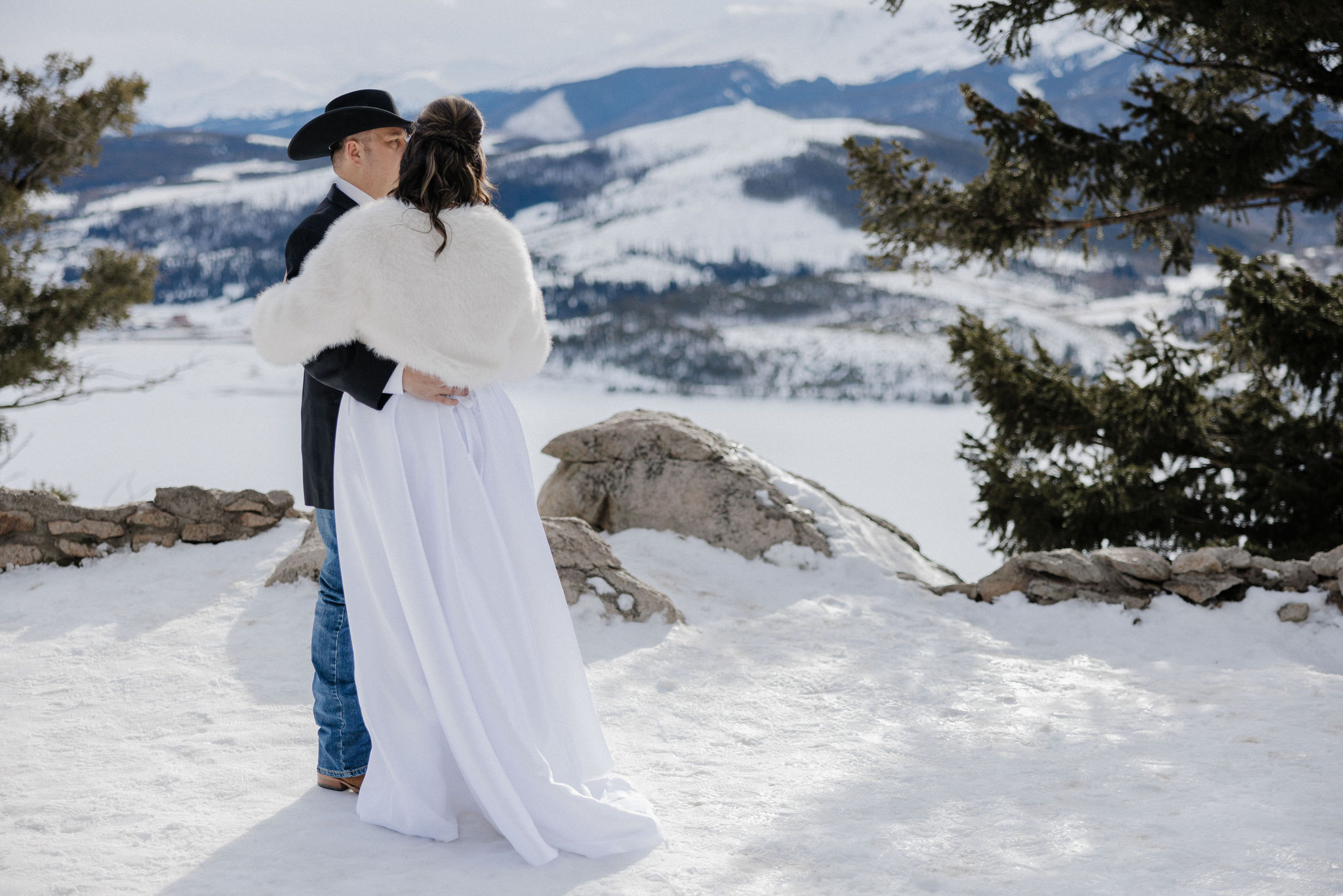 Bride and groom share first dance during a snowy elopement at Sapphire Point Overlook.