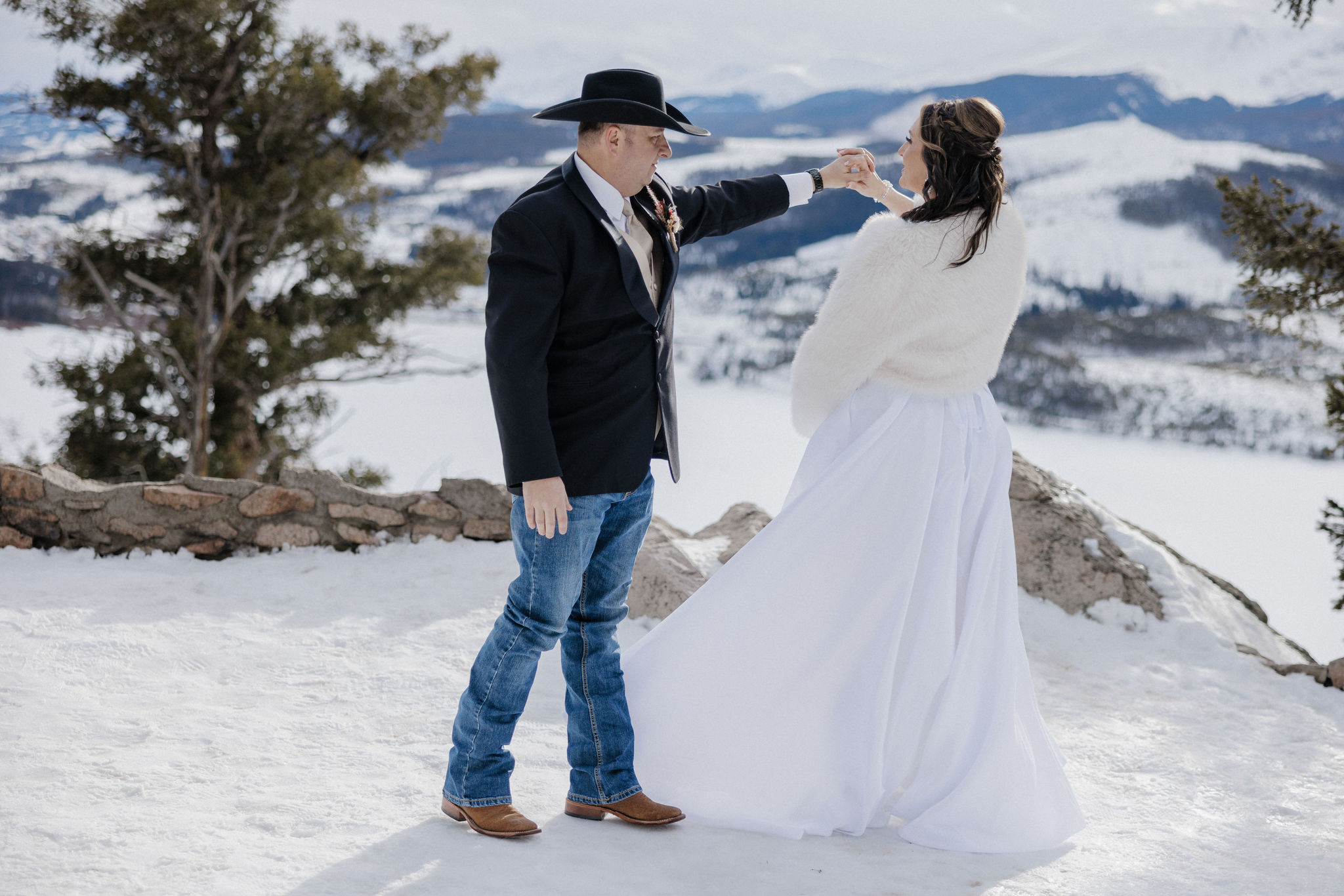 Bride and groom share first dance after eloping in Colorado.