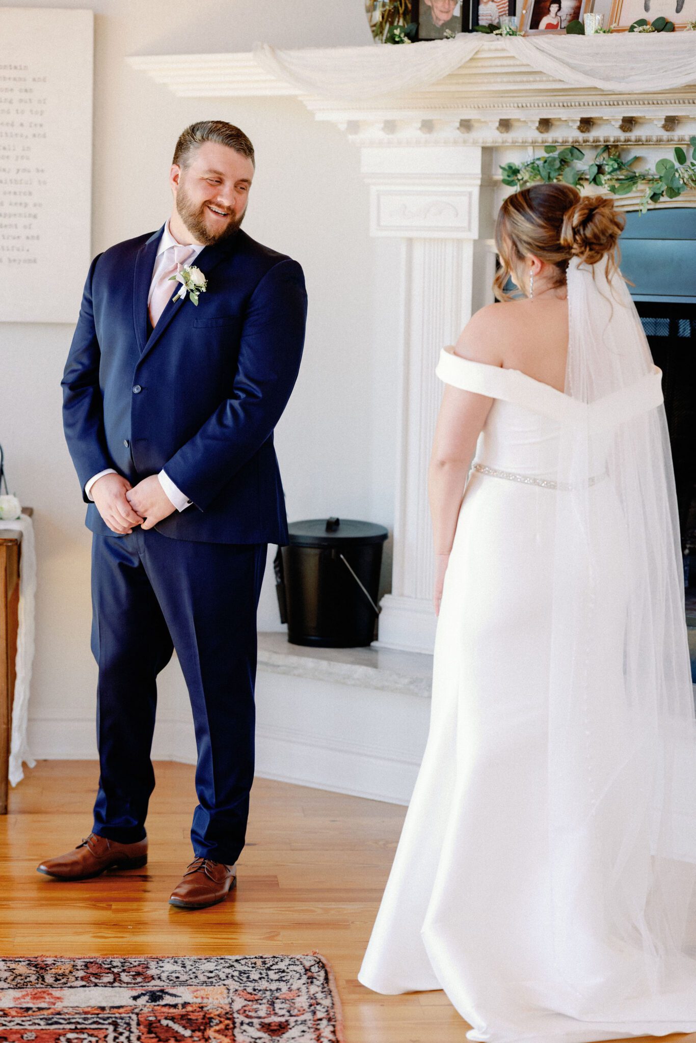 groom turns around and sees bride for the first time during wedding day first look
