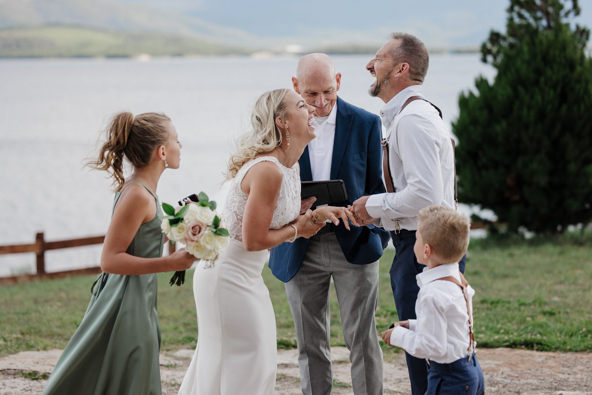 bride and groom laugh during their second wedding ceremony