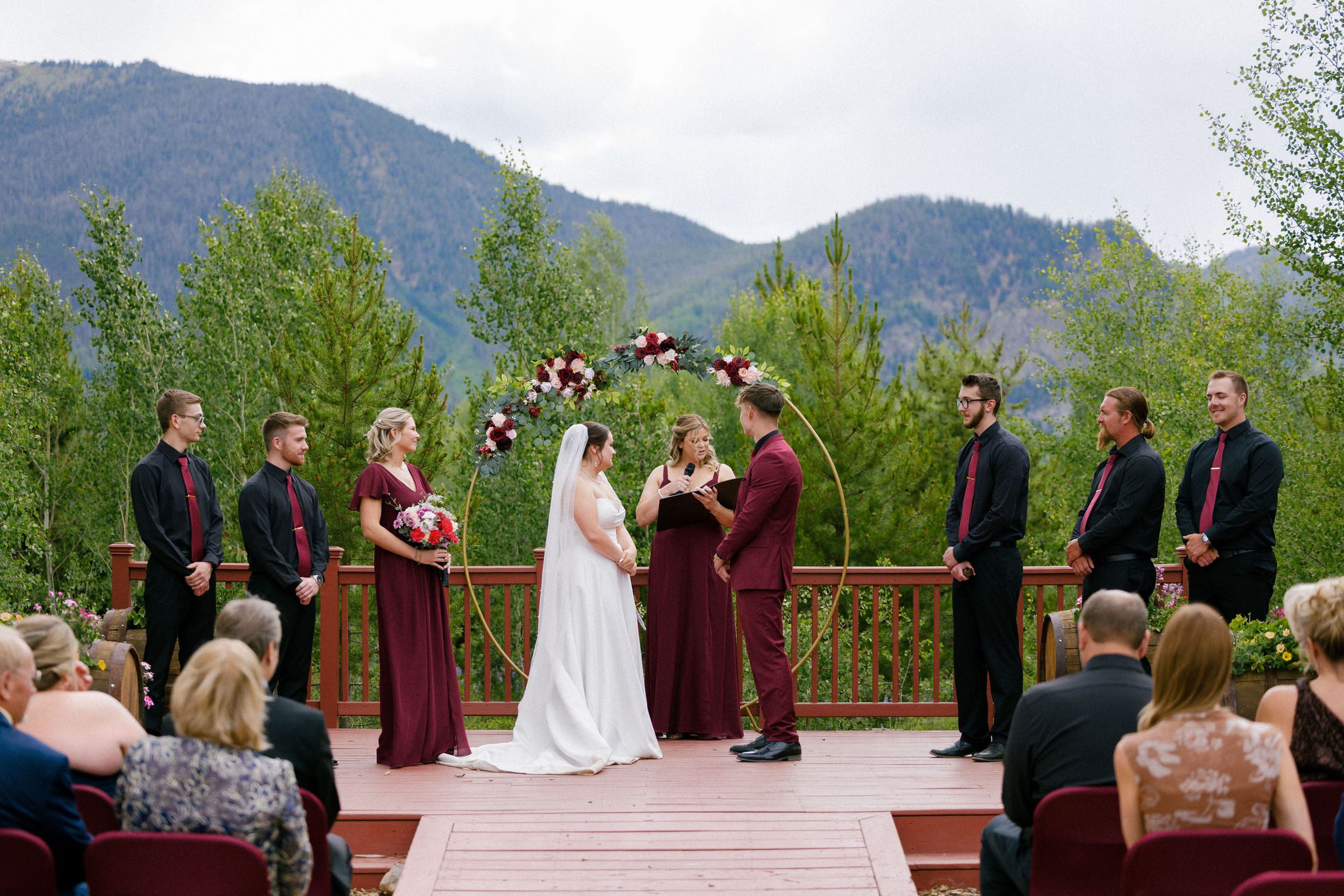 bride and groom stand at altar during sober wedding in colorado