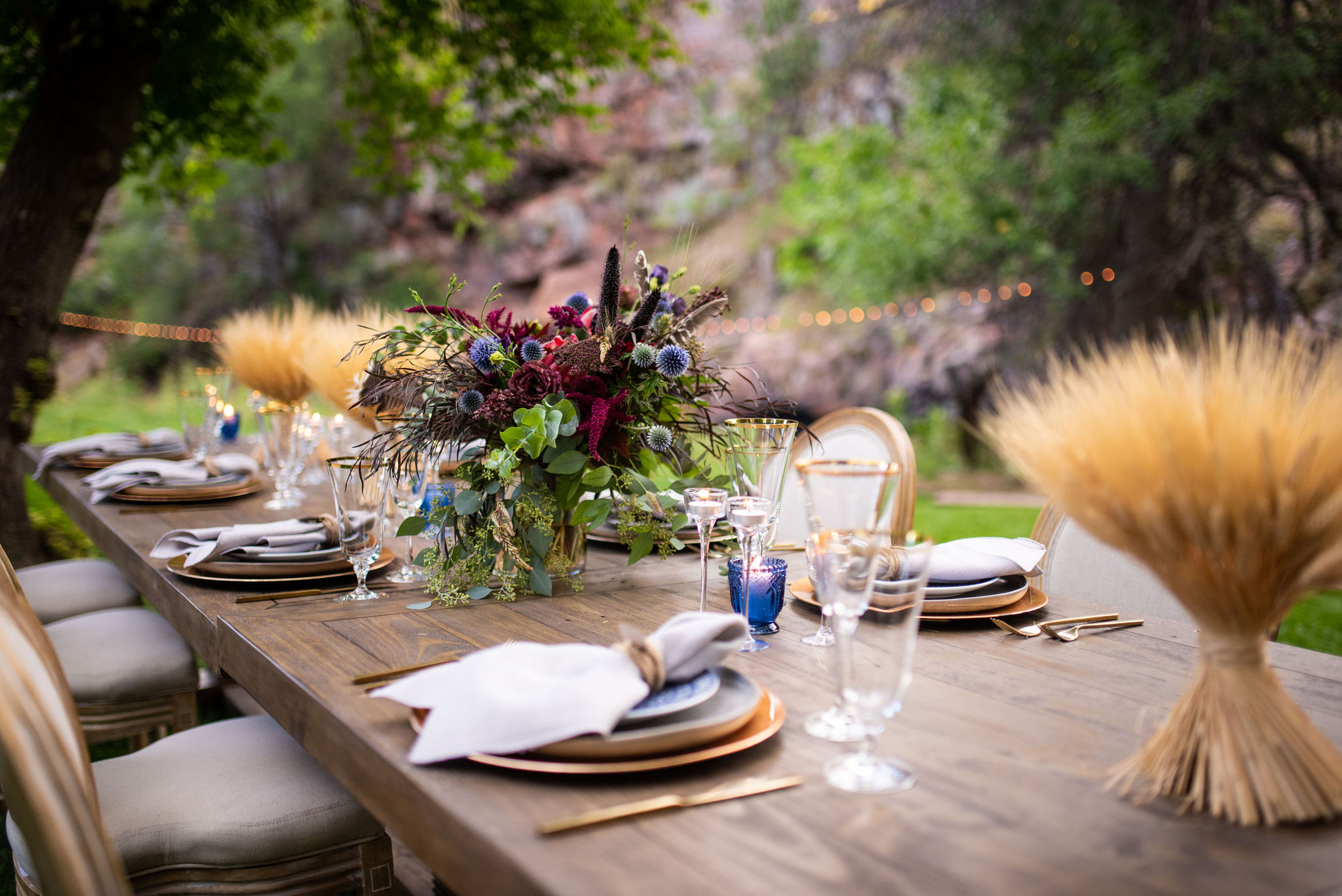 dinner table set up with florals at river bend wedding venue in colorado