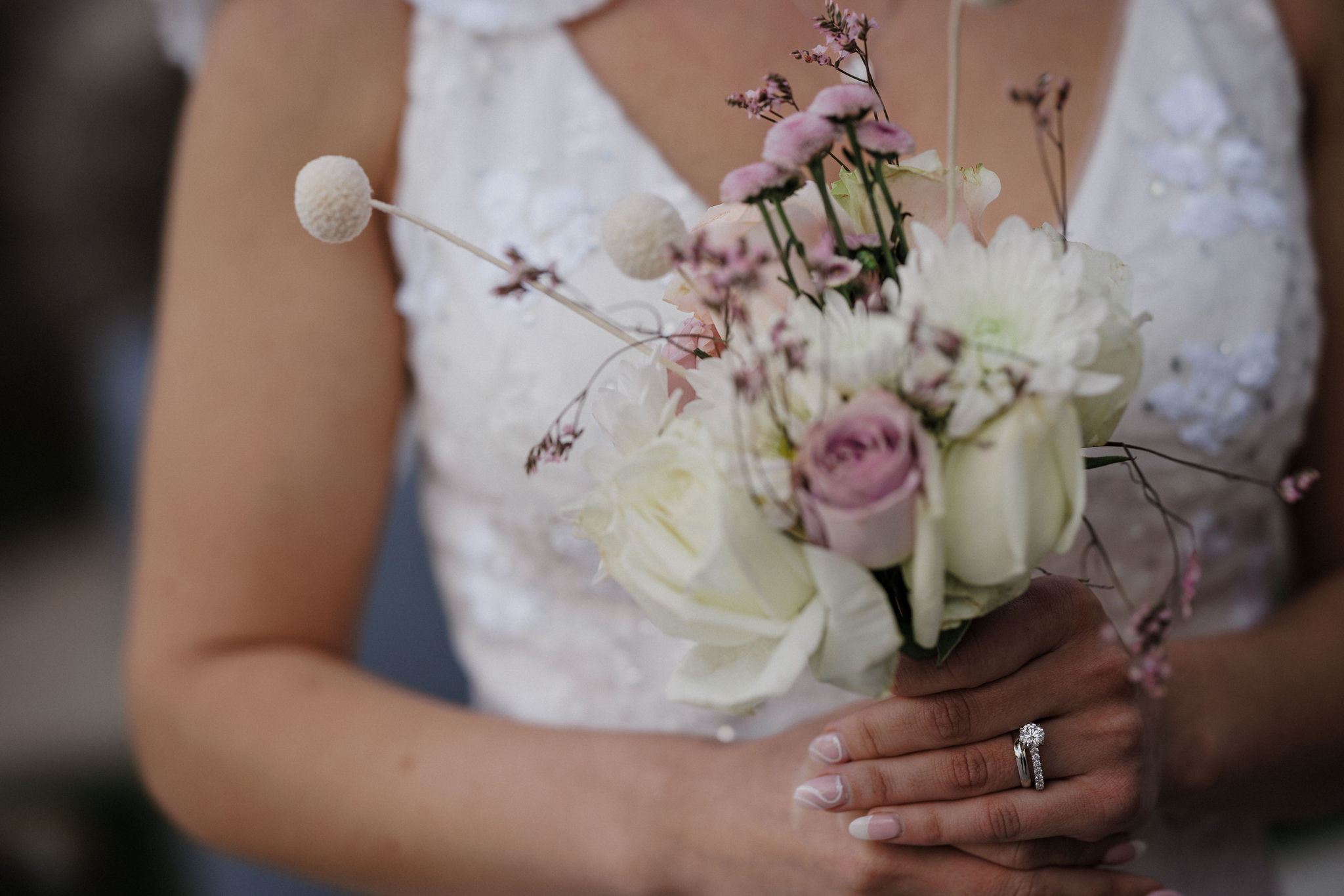 bride holds bouquet during denver courthouse elopement