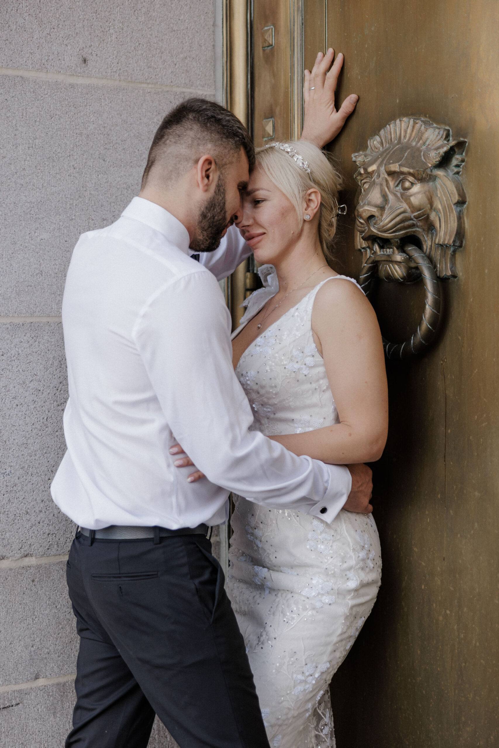 groom leans over bride during colorado denver elopement.