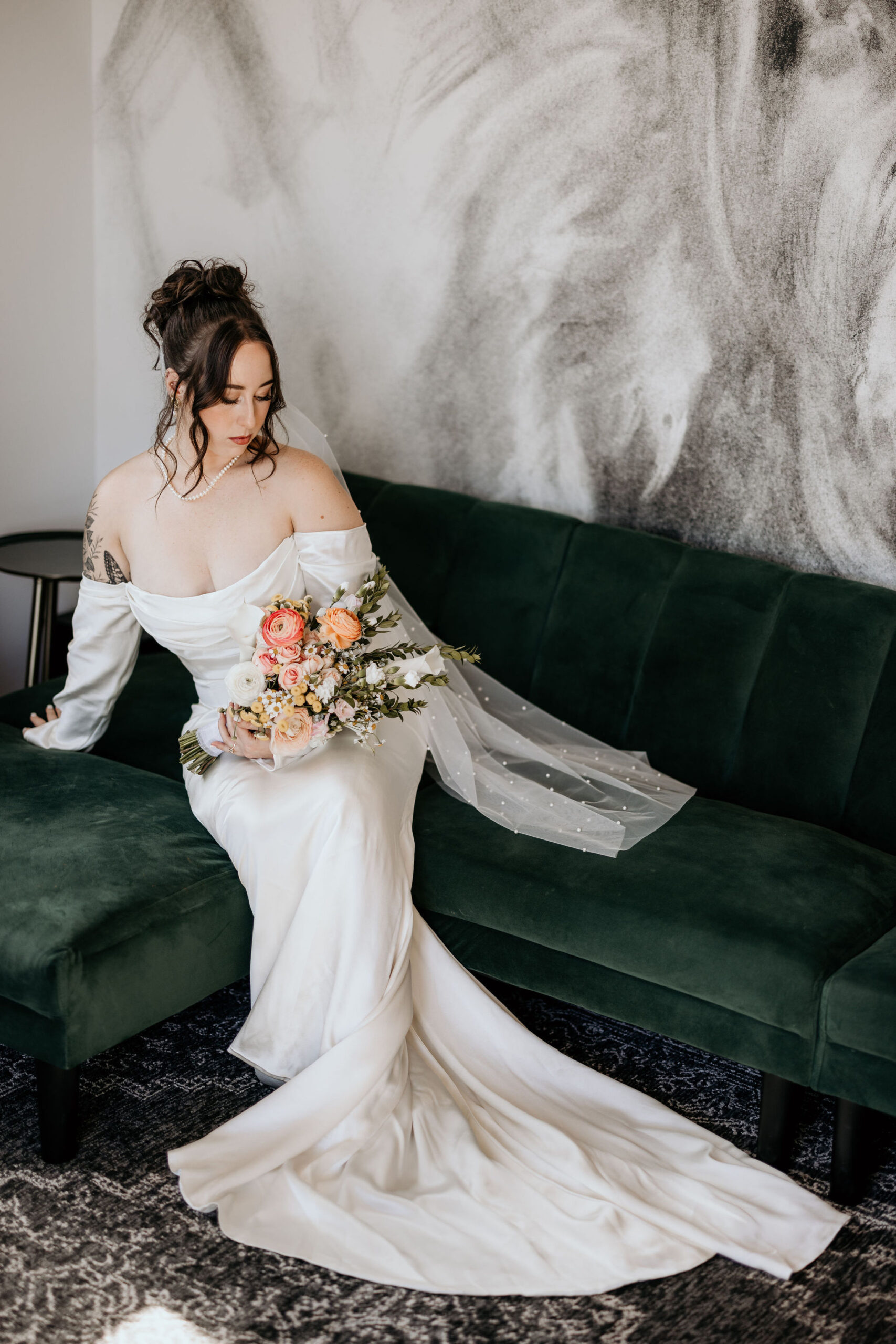 bride takes bridal portraits in colorado airbnb wedding venue