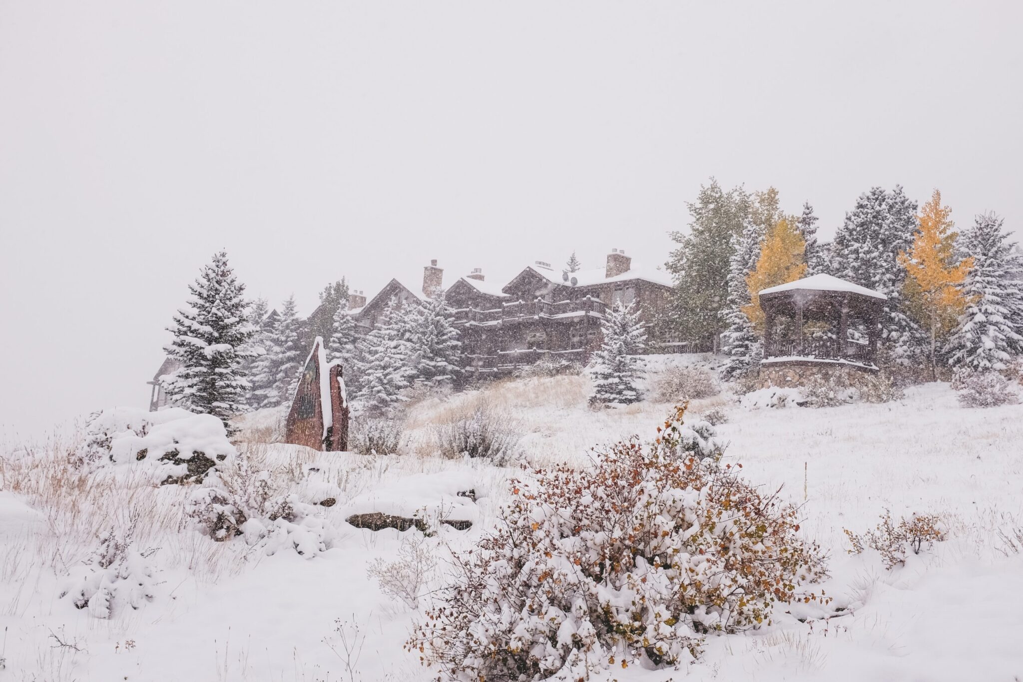 colorado micro wedding venue with lodging sits on hill in the snowy fall