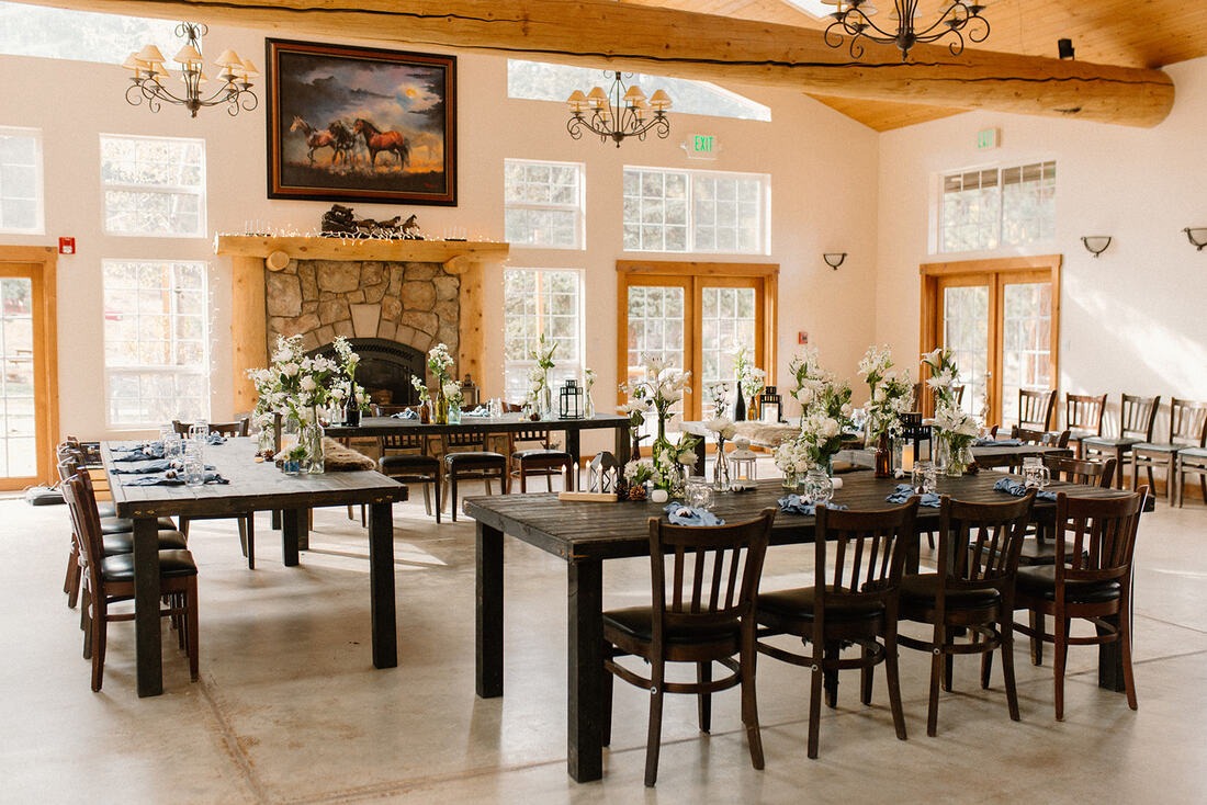 tables set up for micro wedding in mountain lodging