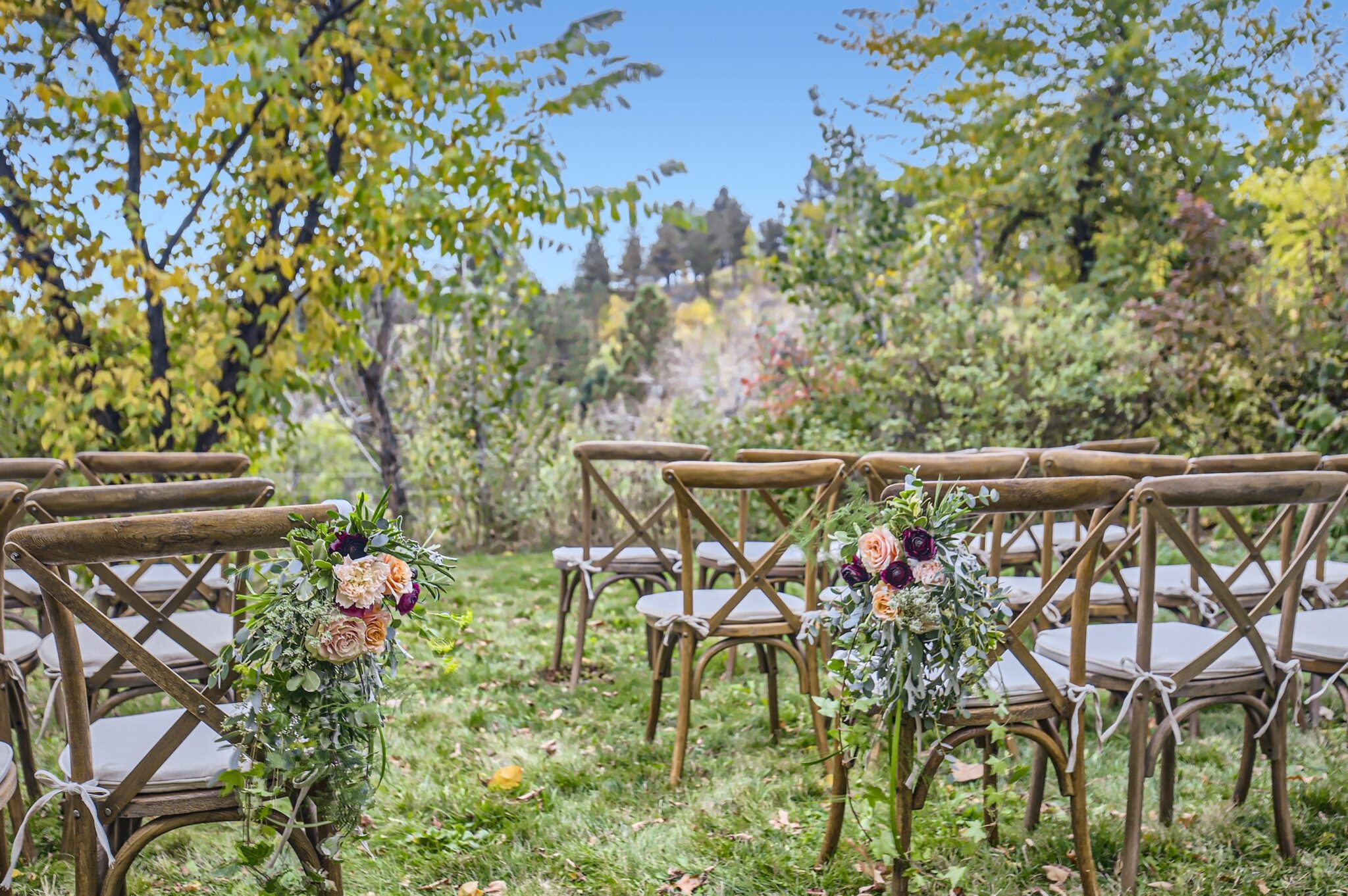 micro wedding ceremony set up outside of lodging in colorado