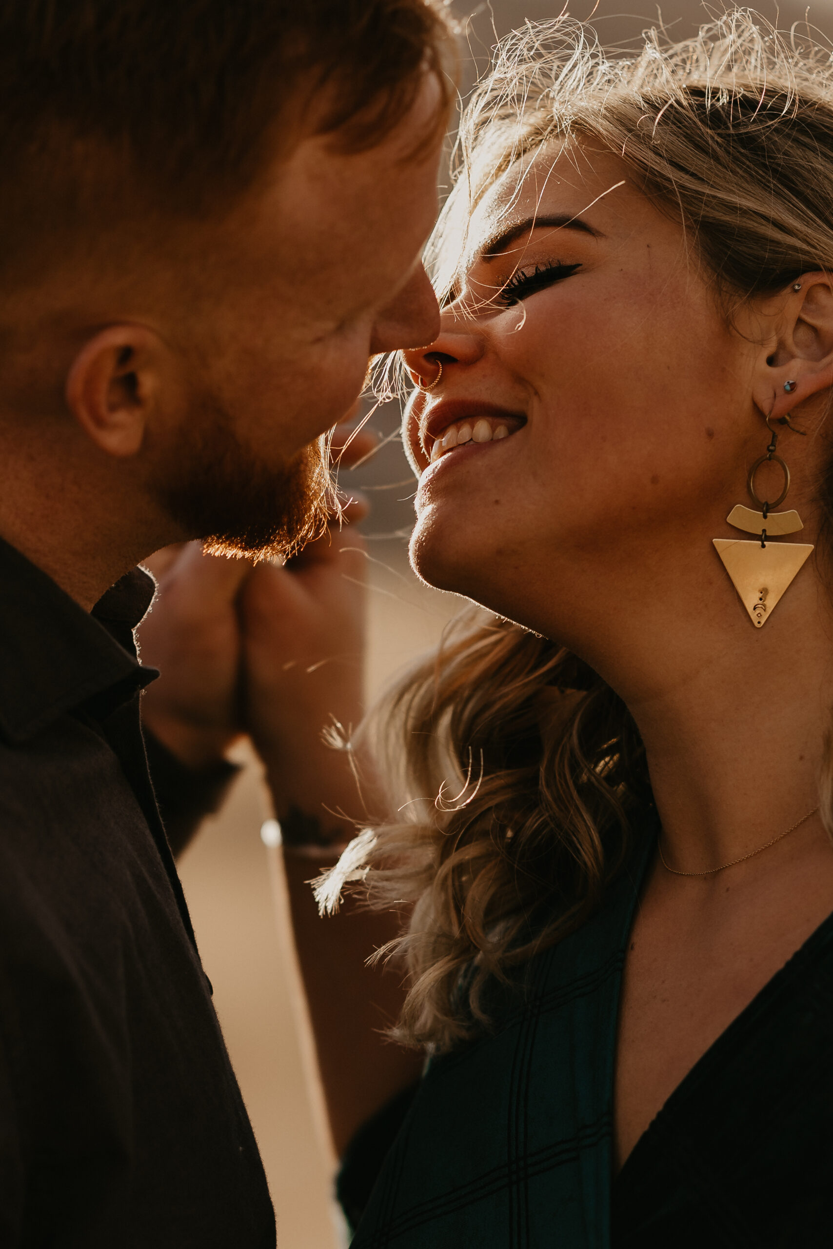 engaged couples kisses during colorado engagement photos