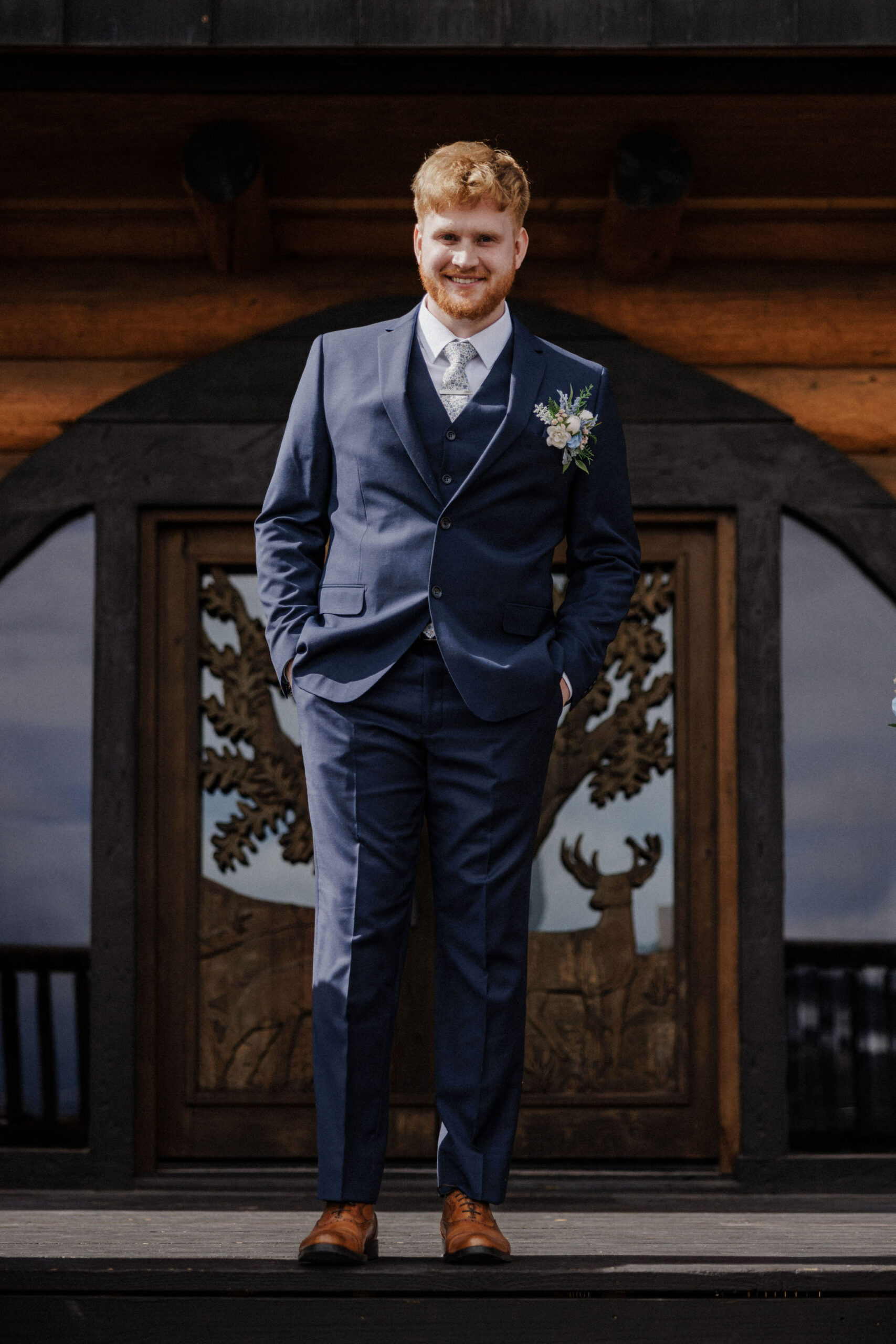 groom smiles at colorado micro wedding photographer